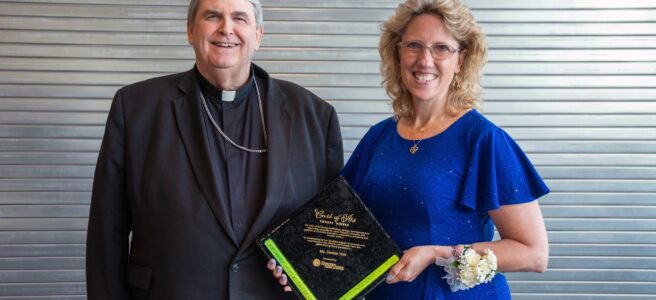 Picture of Denise with the Bishop of Buffalo and the Cure of Ars Award.